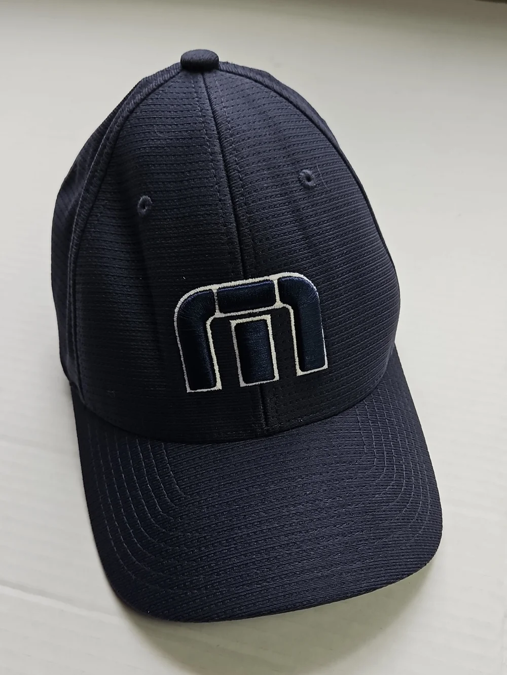 Travis Mathew Blue Hat with White Script Logo